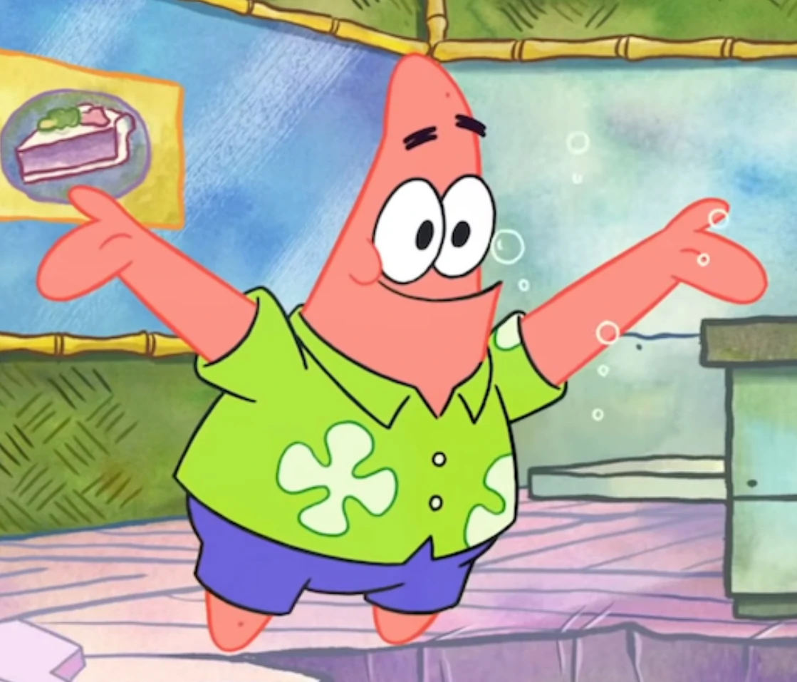 Patrick wearing a shirt in a good mood.